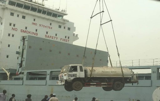 ISL int shipping displays heavy lift handling Services. A tanker is being unloading from sea ship by ISL int ship.
