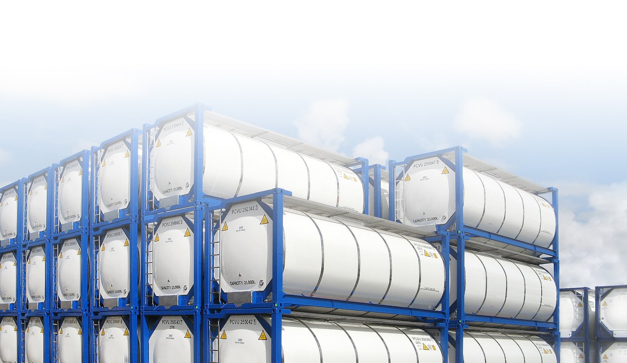 white ISO tanks container parked on a shipping yard in racks.